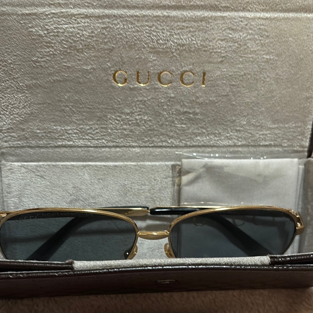 Gucci Gold Frame Sunglasses with Dark Lenses